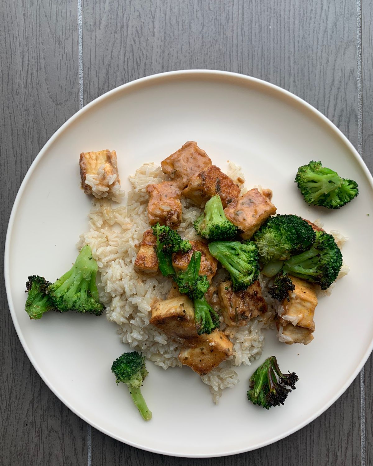 tofu over rice and broccoli