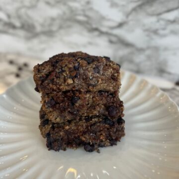 3 oatmeal chocolate chip bars stacked on top of each other