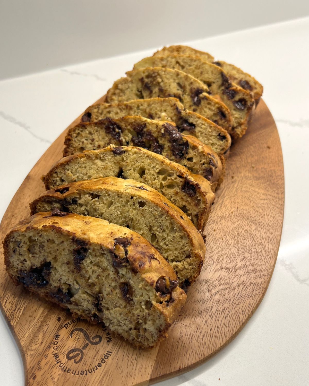 slices of banana bread on cutting board 