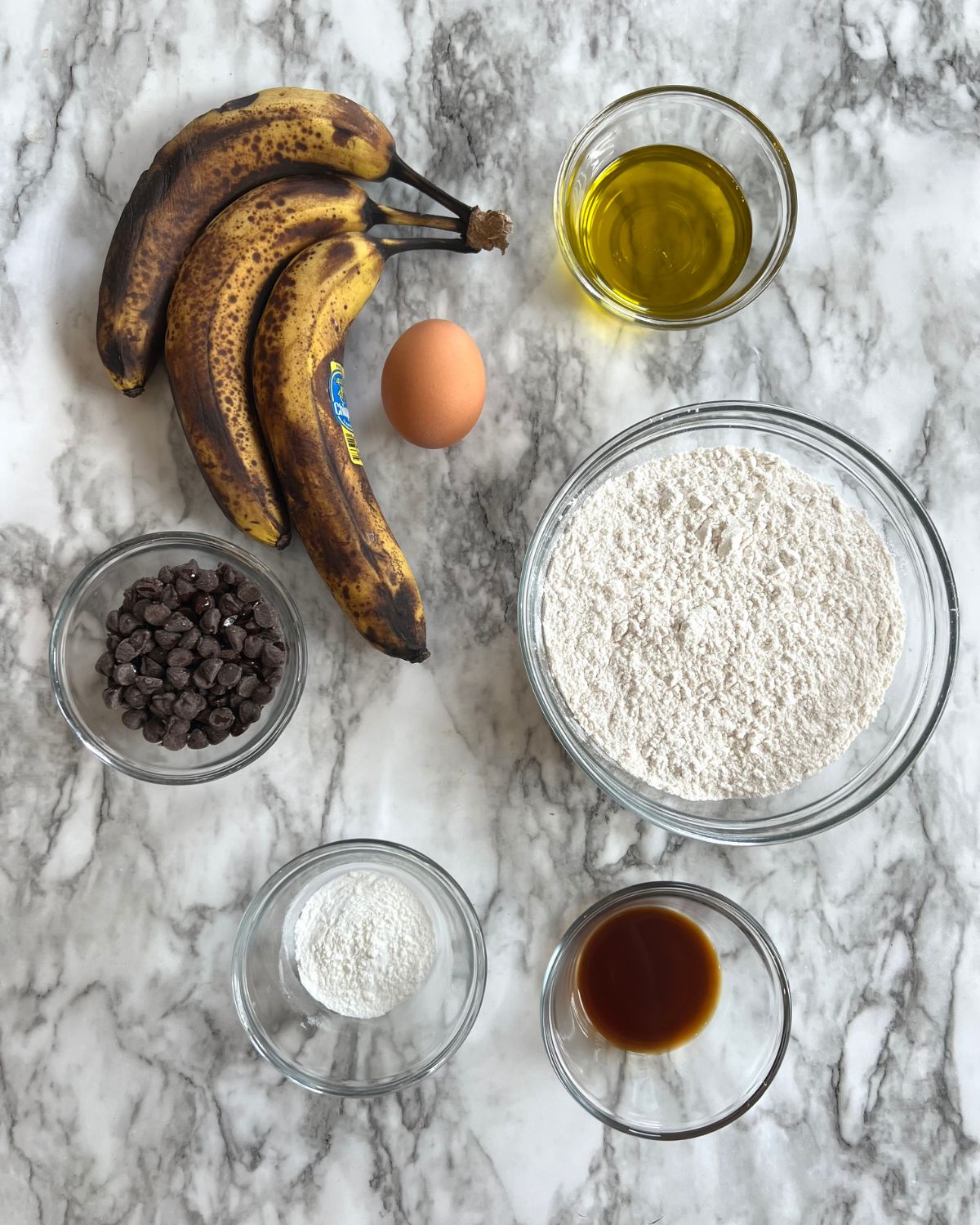 ingredients for banana bread laid out on table 