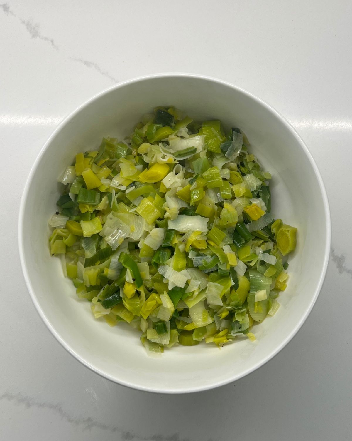 sautéed leeks in serving bowl 