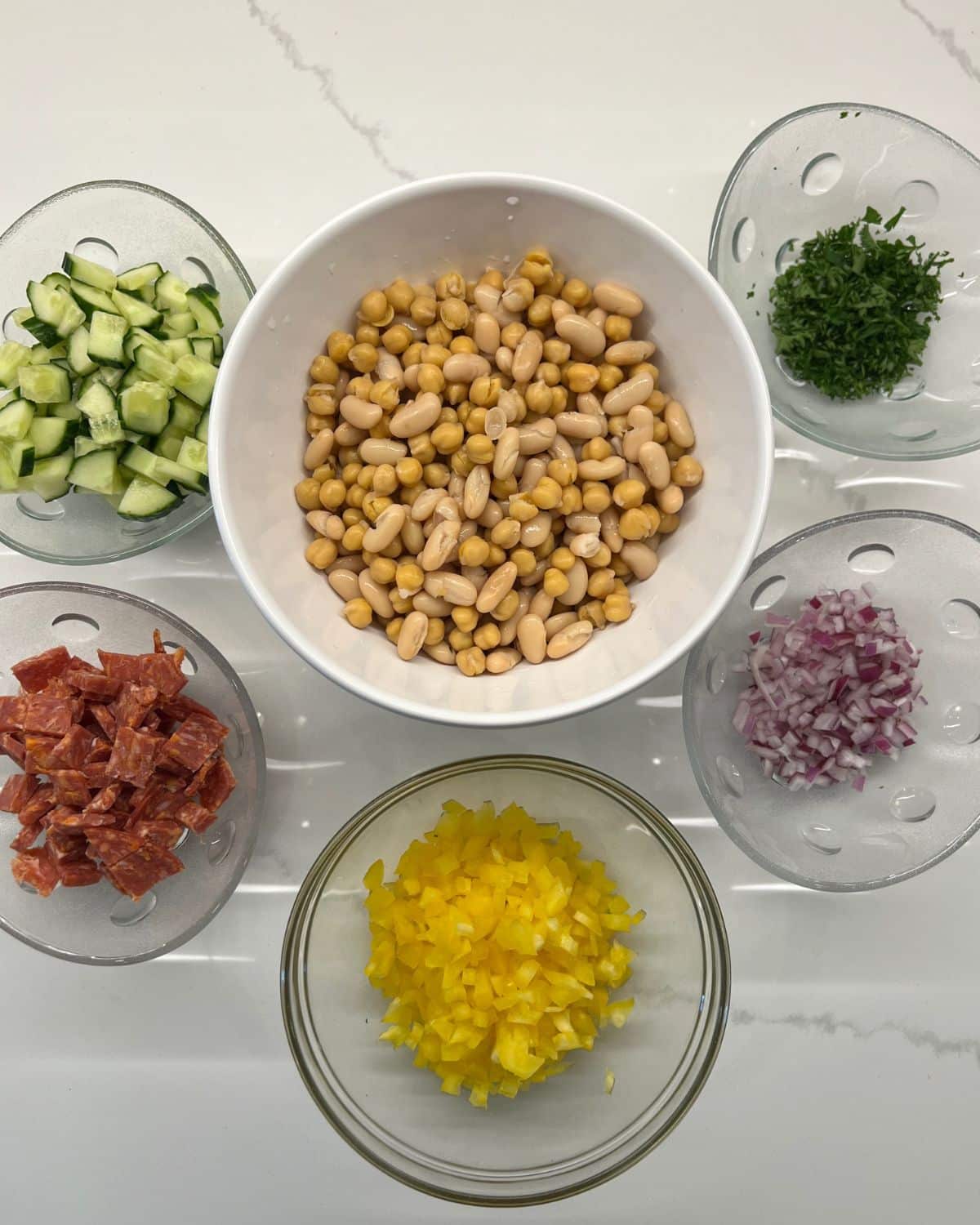 ingredients for salad laid out on table  