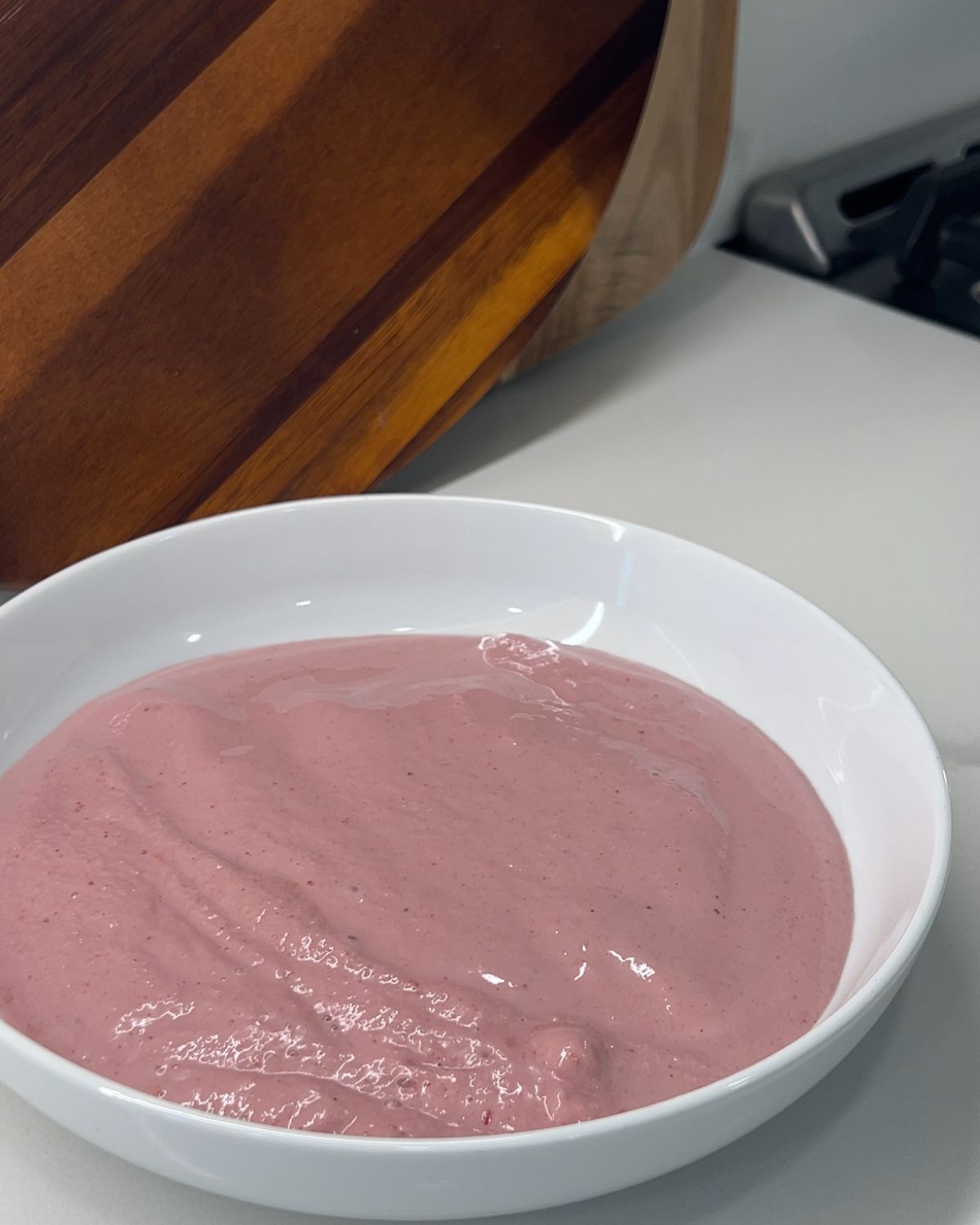 smoothie poured into bowl - soft pink colour 