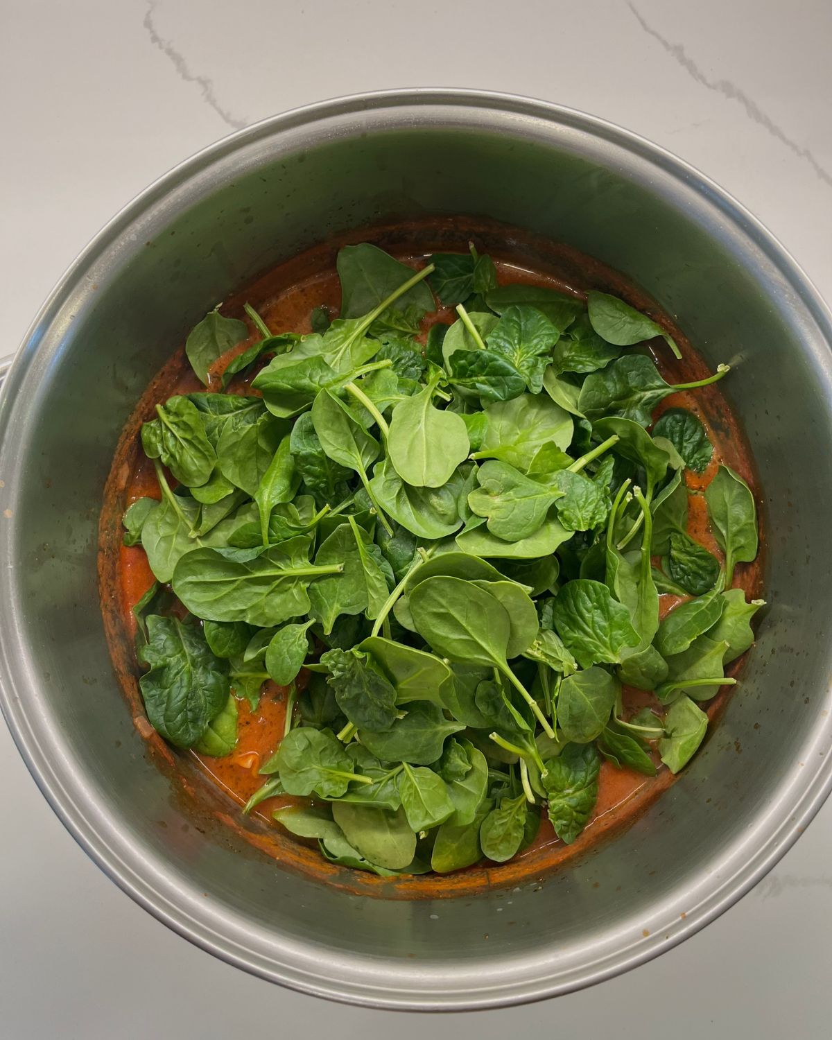 spinach added to the pot 