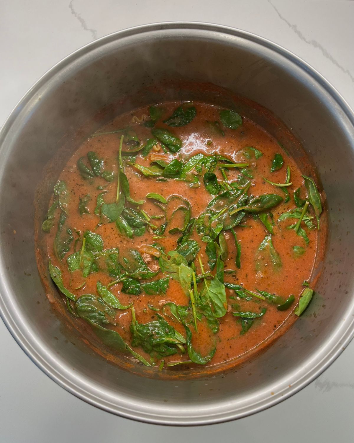 spinach cooking in the pot 