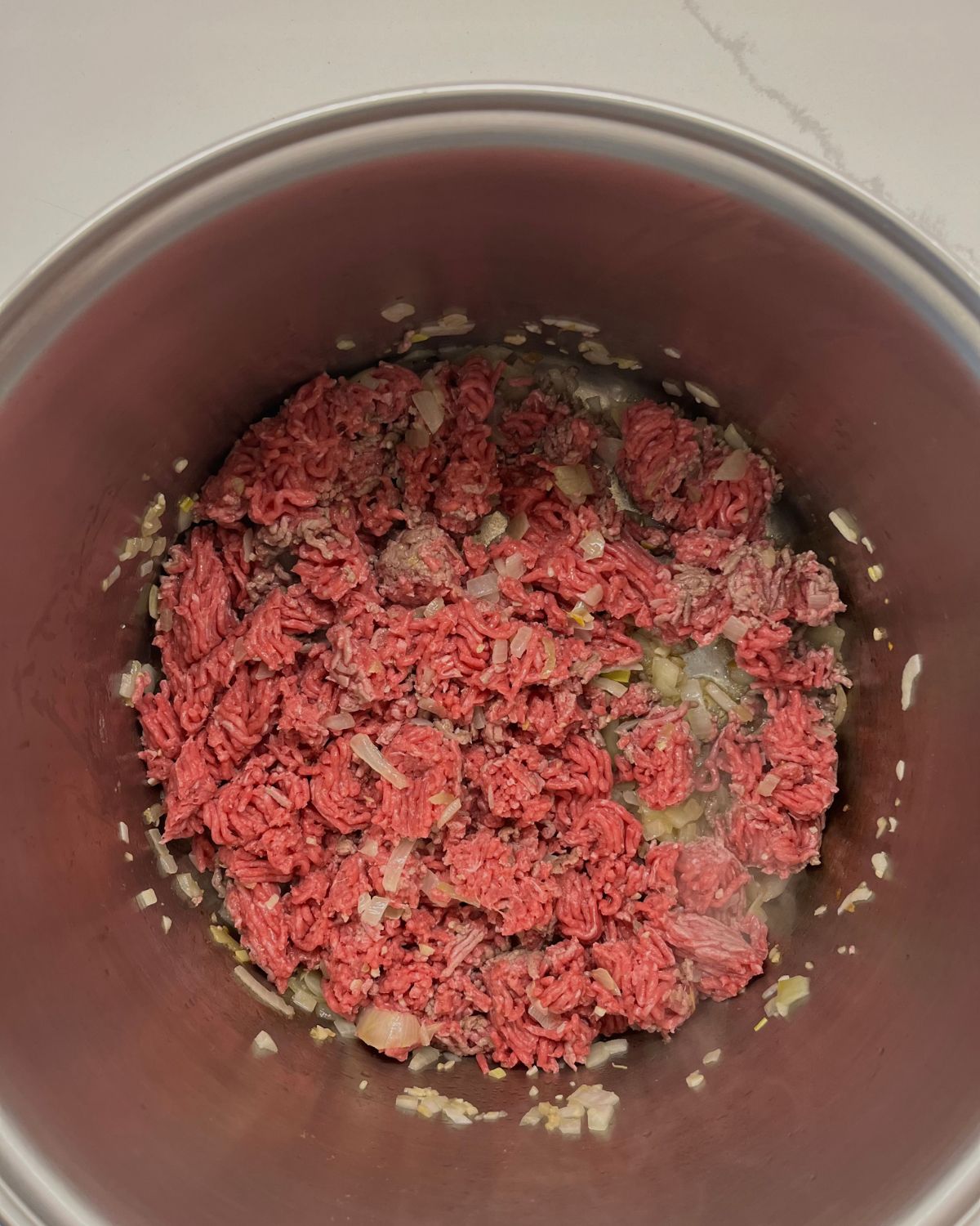 ground beef added to big pot 