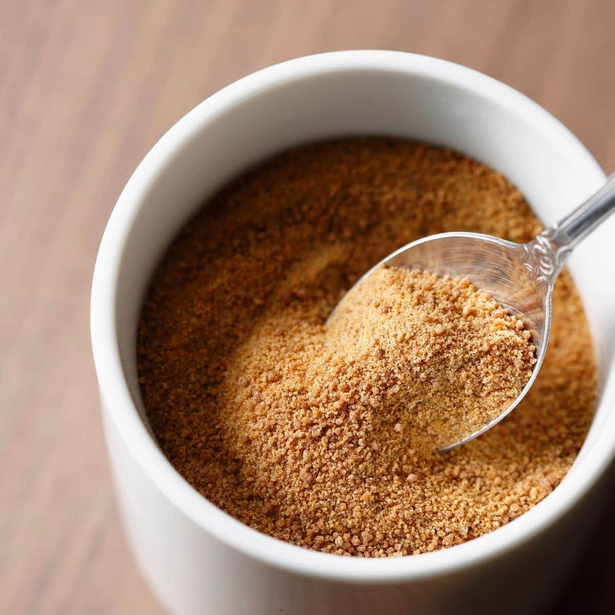 brown sugar in a bowl with spoon