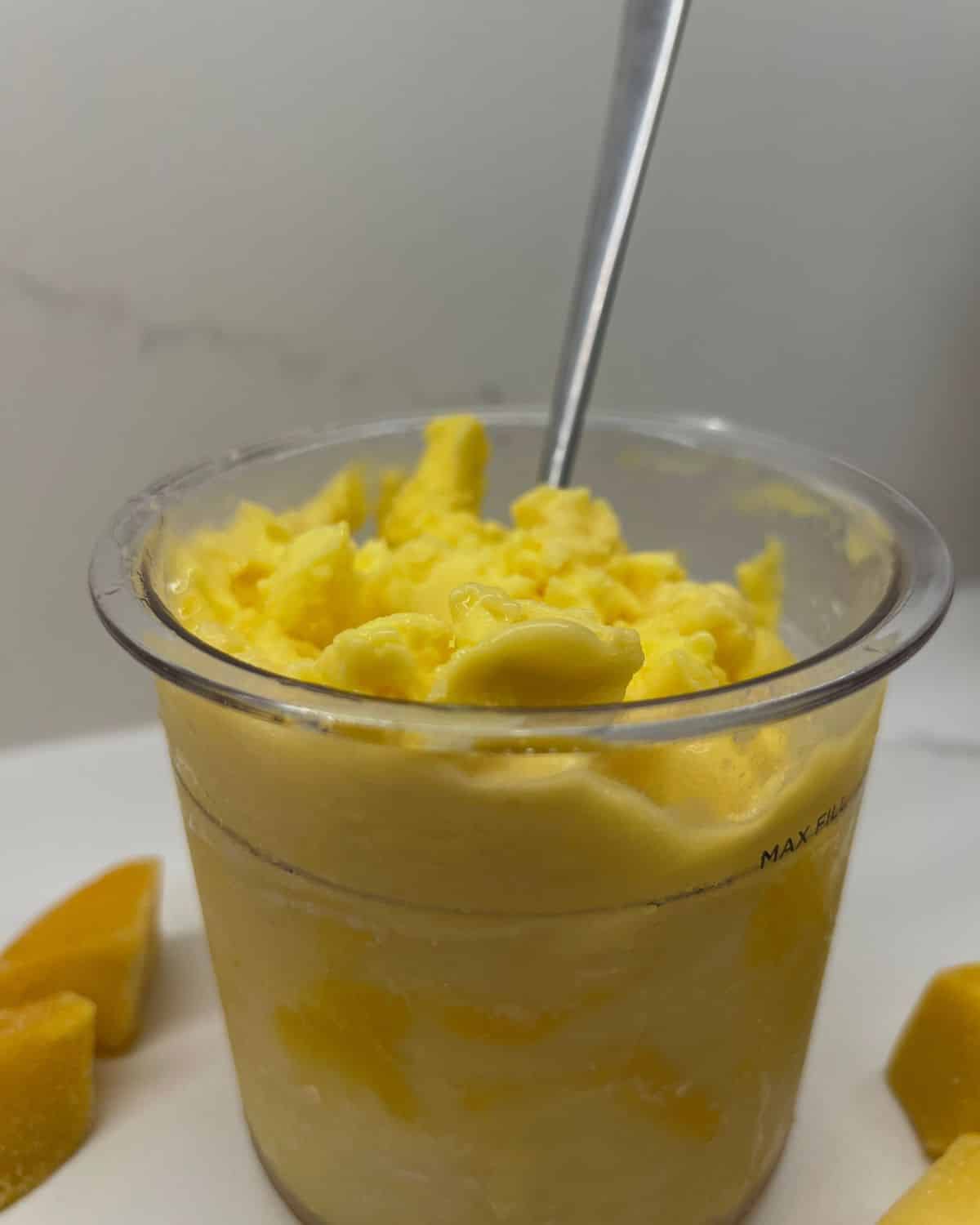 mango ninja creami in the pint with big spoon