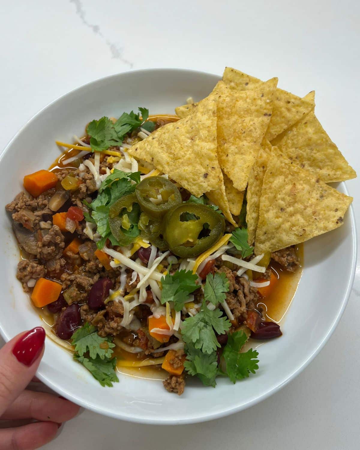 chili in big bowl with toppings 