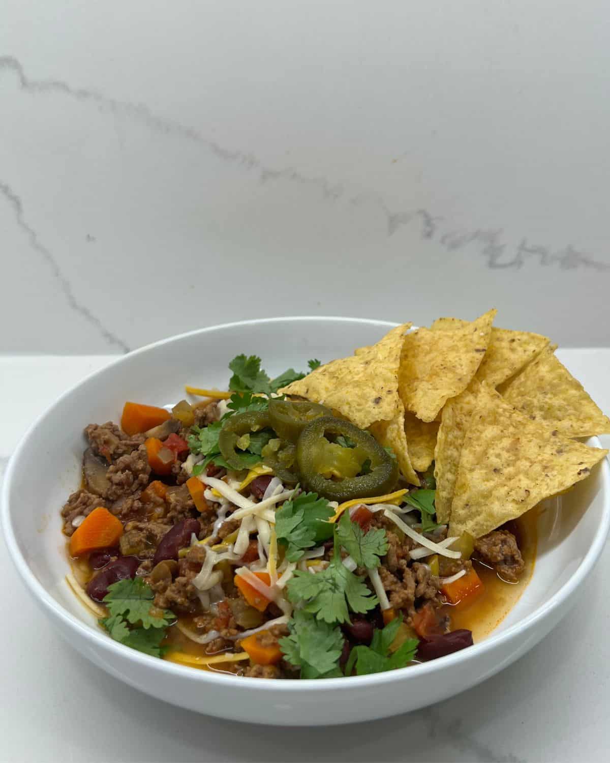 chili in big bowl with toppings 